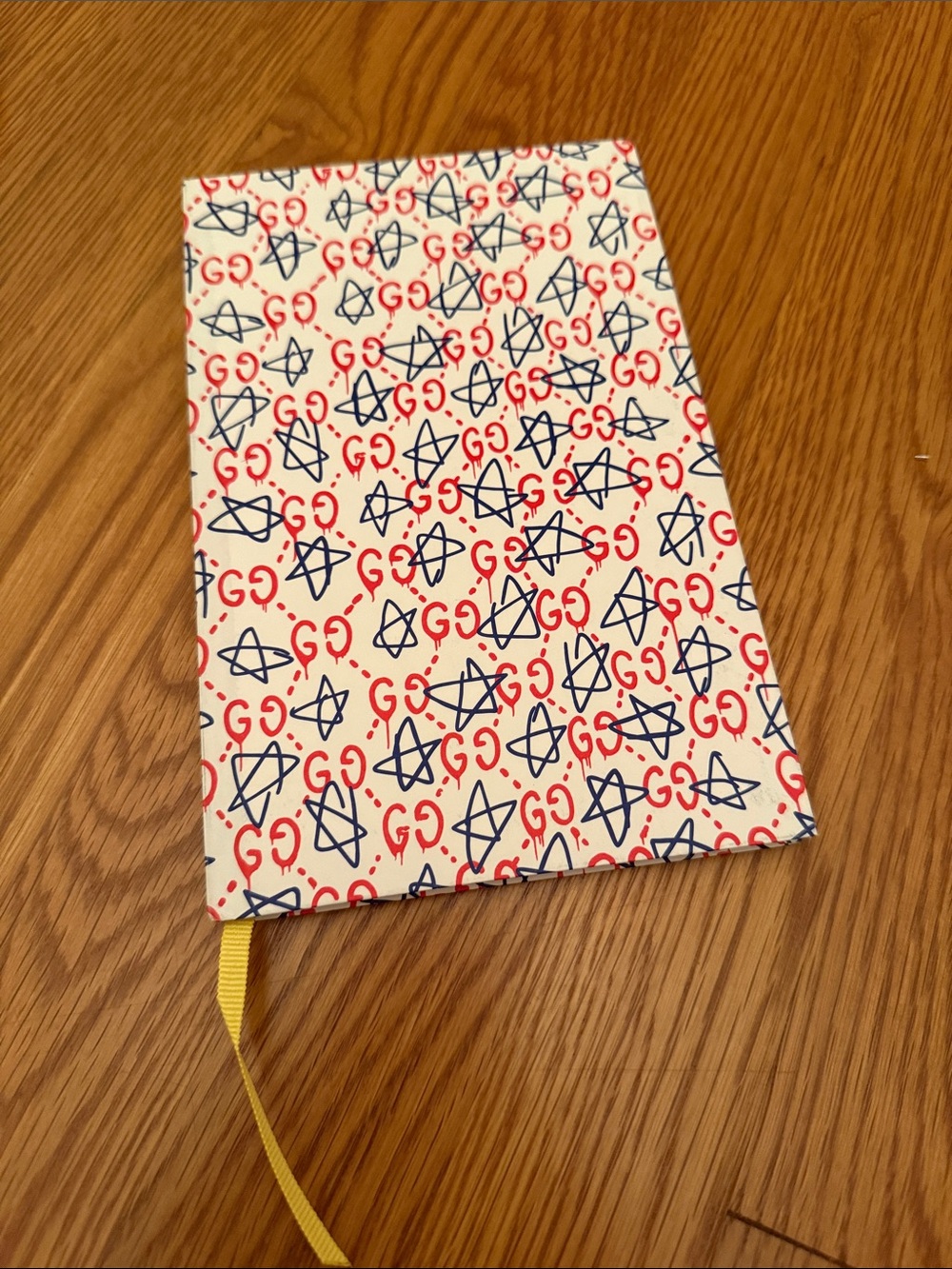 Gucci Boutique Notebook with stickers inside.